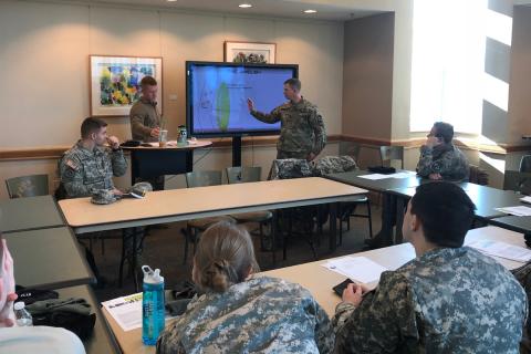 UNH ROTC Cadre and Staff in conference room