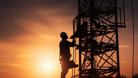 Worker on a wifi tower