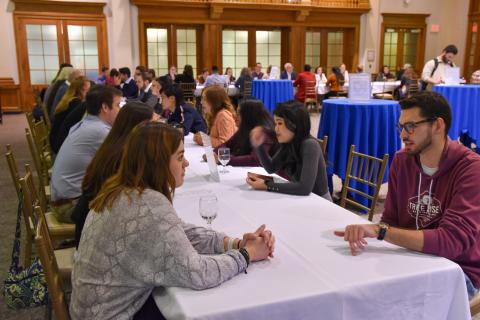 Image of UNH students and Alumni practicing networking skills at No Stress Networking Night