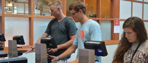Students Scanning Fingers at Dining Hall