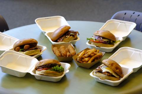 Burgers from Artisan Fresh in their to-go boxes