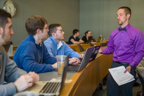 students and professor in a lecture hall