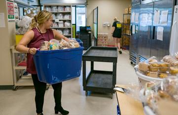 UNH student participating in community service work