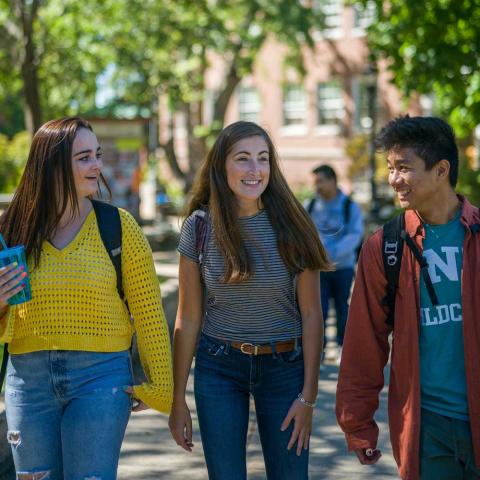 students walking on UNH campus