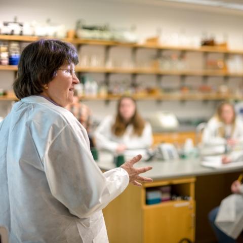 professor and students in lab