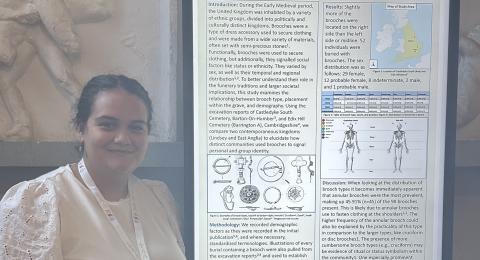 student presenting at conference, digital research poster