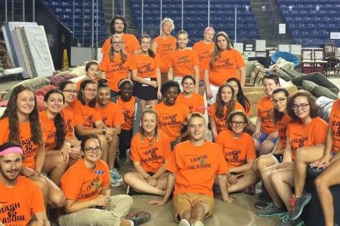 Students in Trash 2 Treasure shirts at annual campus yard sale