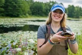 student holding turtle