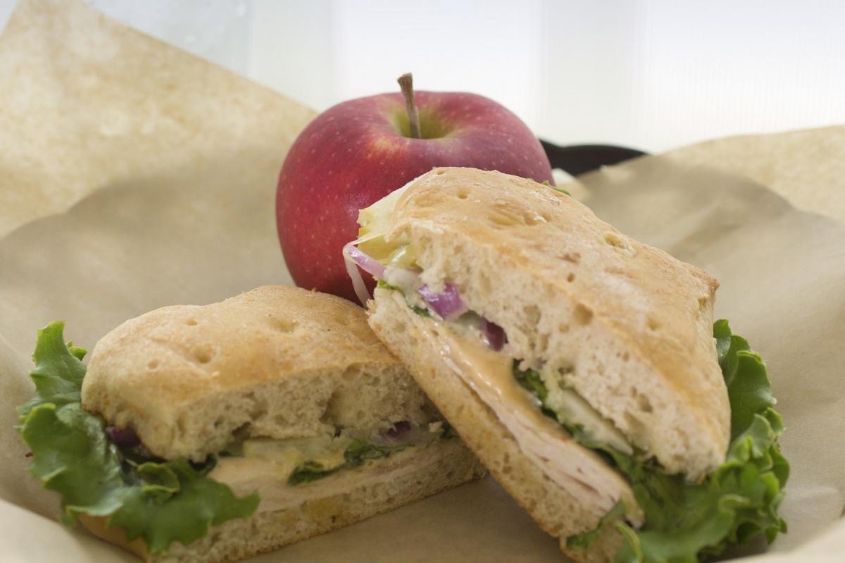 sandwich and apple on plate at UNH Dairy Bar