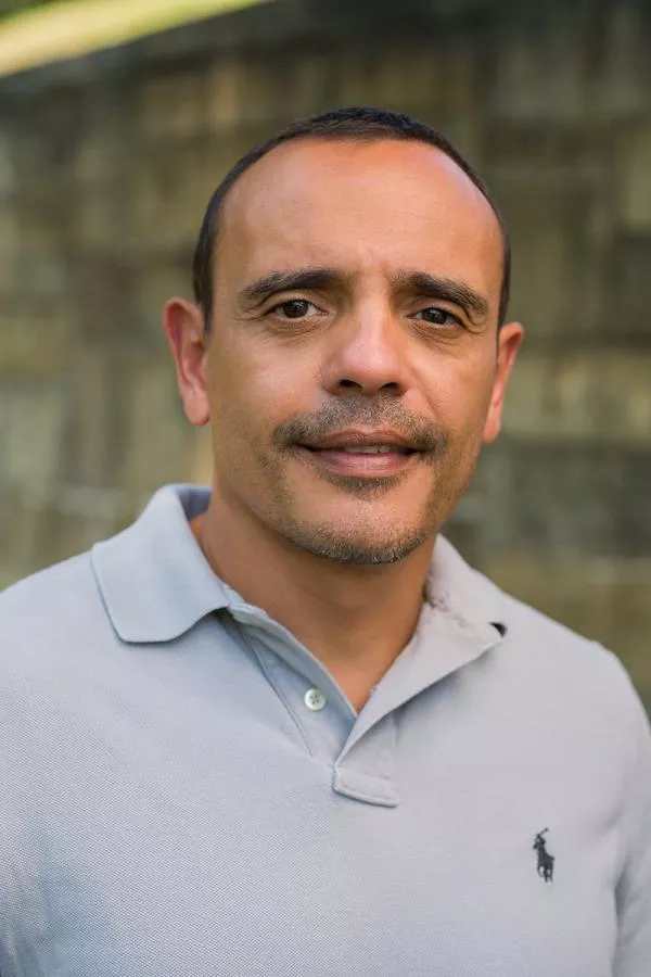 A headshot of UNH dairy researcher Andre Brito