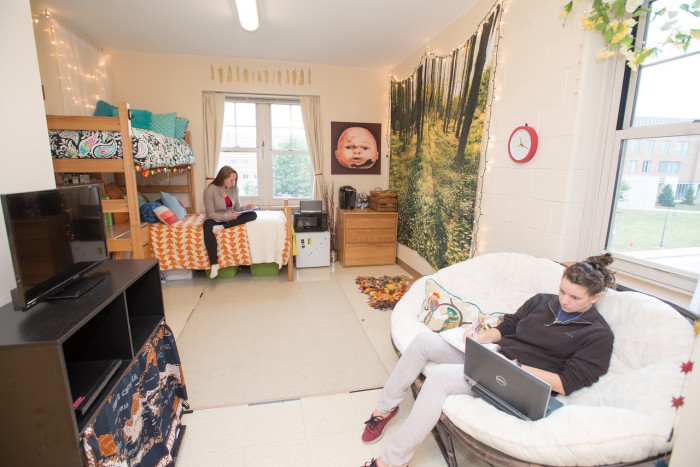 UNH students working in their dorm room