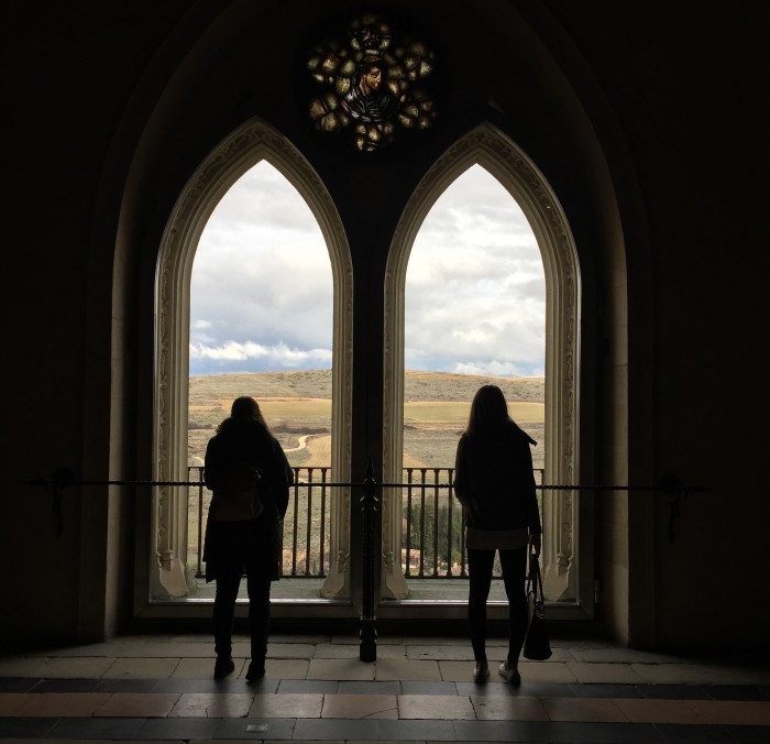 UNH Granada program students looking out windows in Spain