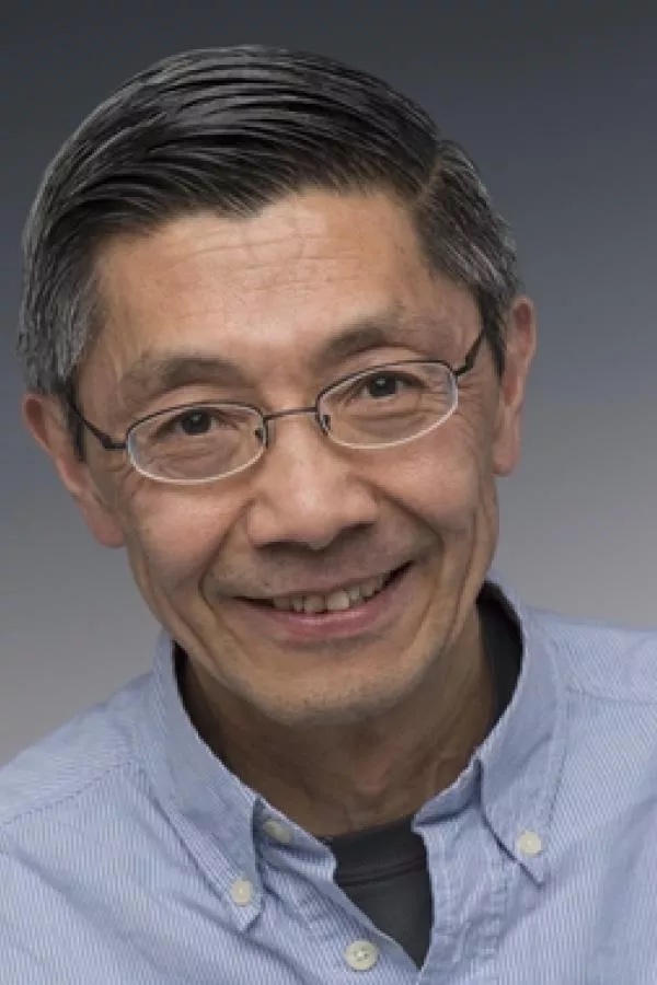 A headshot of UNH dairy researcher Paul Tsang