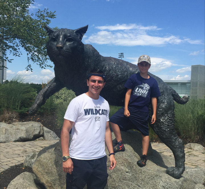 Vinnie LoBuono '20 with his brother in front of the UNH wildcat statue