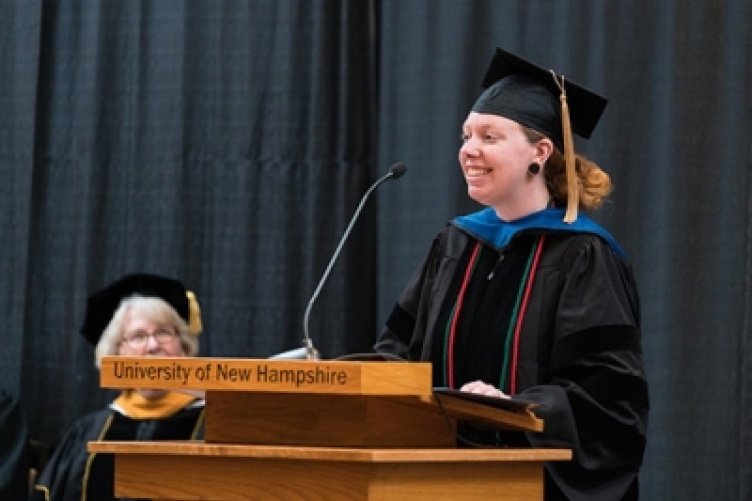 Samantha Reynolds delivering the faculty address at the college's Honors Convocation