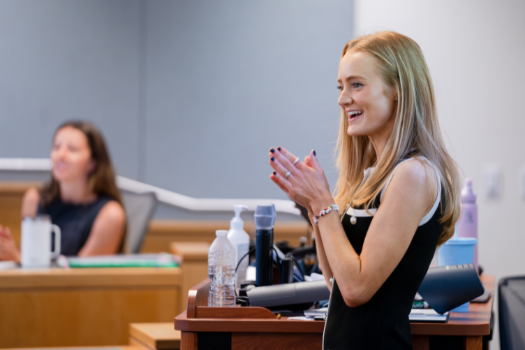 Emma Frank lectures at the front of a Paul College classroom.