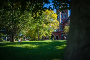 Students walk outside of Thompson Hall