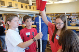 Sixth-graders from Pine Tree and Josiah Bartlett schools working together on a science project