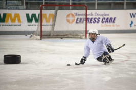 UNH/Northeast Passage sled hockey player