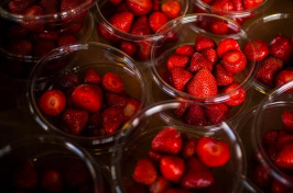 glass bowls filled with strawberries
