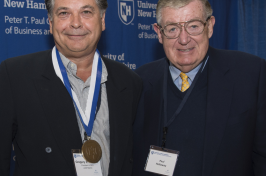 Gregory Sancoff, left, poses with Paul Holloway during the 2016 Paul J. Holloway Prize Competition championship round. 