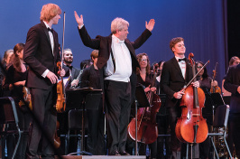 Members of the UNH orchestra with conductor David Upham during a 2017 performance at the Music Hall in Portsmouth, New Hampshire