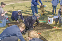 students digging