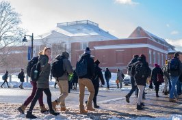 UNH students walking in the snow