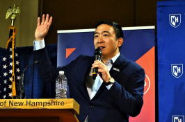 Presidential candidate Andrew Yang speaks at a University of New Hampshire podium at the Carsey School. 