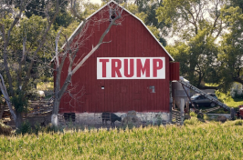 A Trump banner hangs on a barn at a farm in Nebraska in 2018