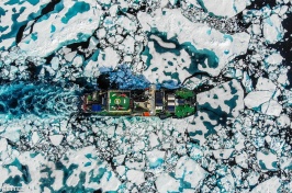 Drone shot of icebreaker in a sea of ice