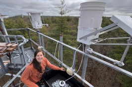 UNH graduate student Desneiges (Deni) Murray at the nitrogen collection site on UNH’s Thompson Farm in Durham, NH.