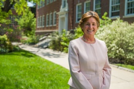 Portrait of Michele Dillon outside of a campus building