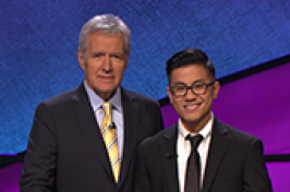 UNH graduate student with Alex Trebek of Jeopardy! game show