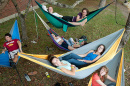 students relaxing in hammocks