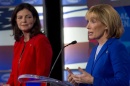 Maggie Hassan (r.) the governor of New Hampshire and Democratic candidate for US Senate, debates incumbent Sen. Kelly Ayotte (R) on Nov. 2 in Manchester, N.H. The race is among the toss-ups pollsters are watching to see if Democrats will seize control of the Senate. (credit: Jim Cole/AP)