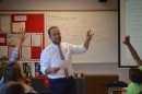 UNH alumnus Tate Aldrich teaches an English class at Laconia High School