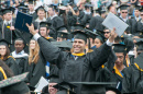 Members of the UNH Class of 2015 celebrate at their commencement