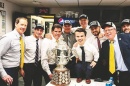Manchester native Mat Myers, to the right of the Campbell Trophy, poses with Nashville Predators staff and coaches including head coach Peter Laviolette, to the left of the trophy. (COURTESY)