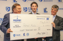 UNH student Peter Abdu ’17 receives a check for $8000