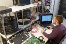 a student working at a computer in the UNH Interoperability Laboratory or IOL