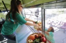 A student studying business and his wife studying social work teamed up on a plan to retrofit buses as mobile markets to bring nutritious offerings to "food deserts." (EPA/Newscom)