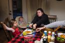 A NH Family Sits Down to Eat Dinner