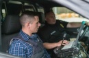 Psychology graduate Taylor Mitchell during a ride along with the Bow Police Department