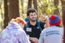 Mason Burke speaks with a group of youth at a recent outdoor adventure in Durham, N.H.