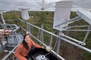 UNH graduate student Desneiges (Deni) Murray at the nitrogen collection site on UNH’s Thompson Farm in Durham, NH.