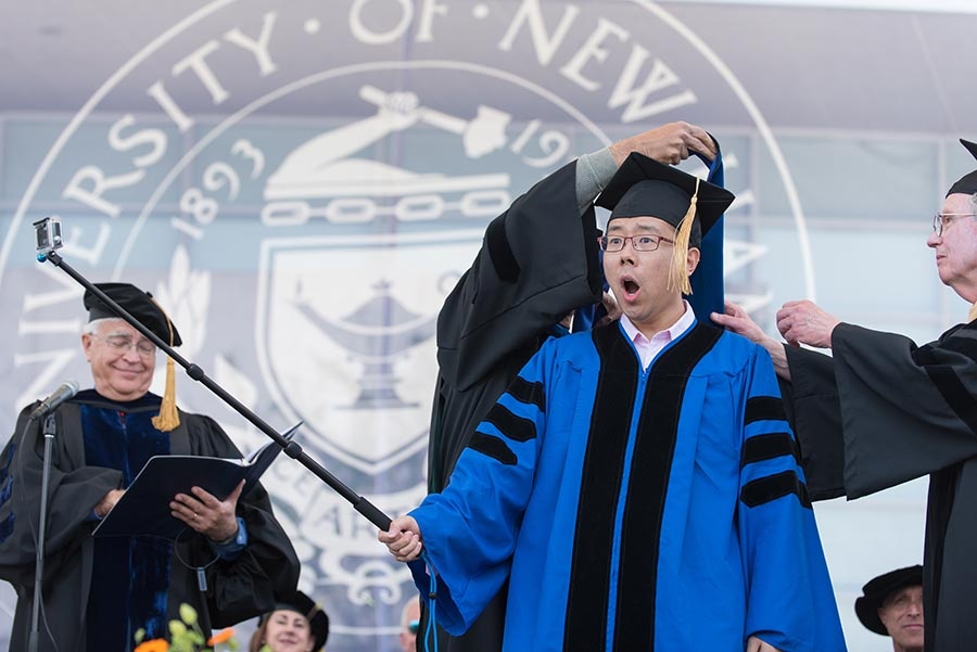 UNH doctoral candidate with selfie stick