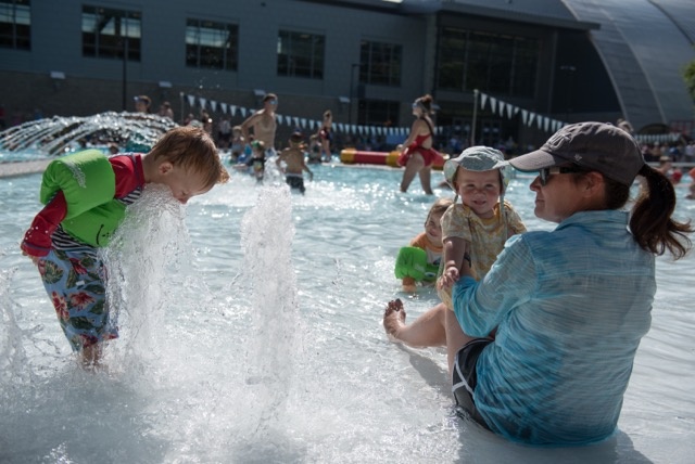 kids playing at the opening of UNH's new outdoor pool