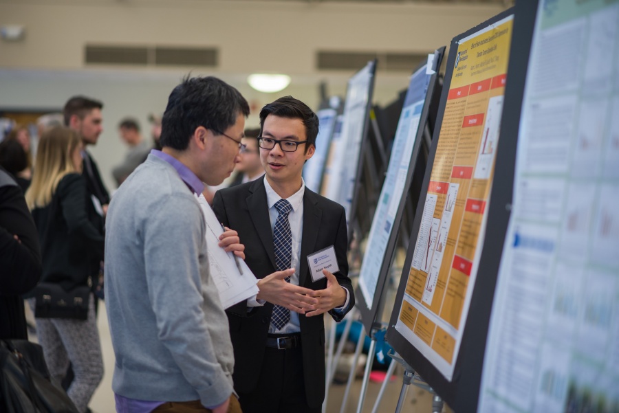 A UNH student presenting the results of his research during the UNH College of Life Sciences and Agriculture Undergraduate Research Conference 2018