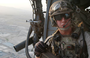 Kandahar, Afghanistan: Captain Eric as the helicopter passes over the outskirts of Kandahar City, Afghanistan.(NGT)